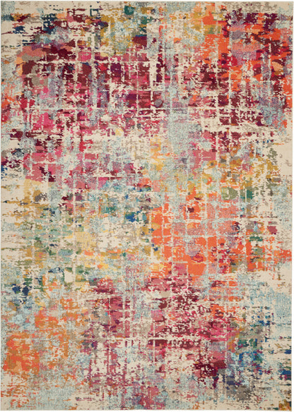 Abstract multicolor area rug with distressed block pattern in pinks, oranges, teals and creams; modern, soft pile.