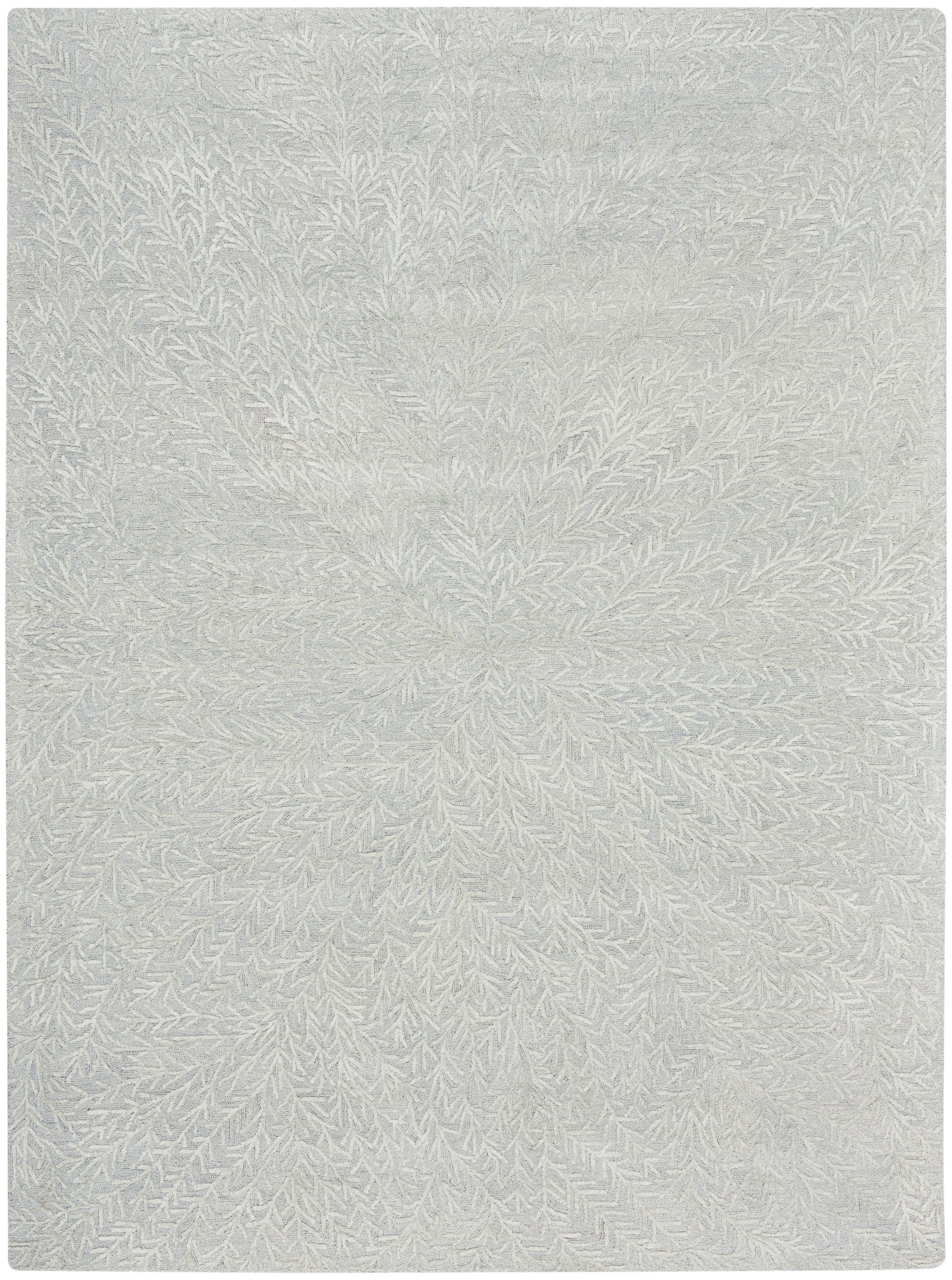 Light gray rug with radiating fern-like pattern and soft plush woven texture.