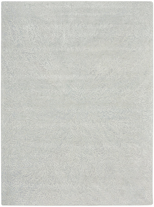 Light gray rug with radiating fern-like pattern and soft plush woven texture.