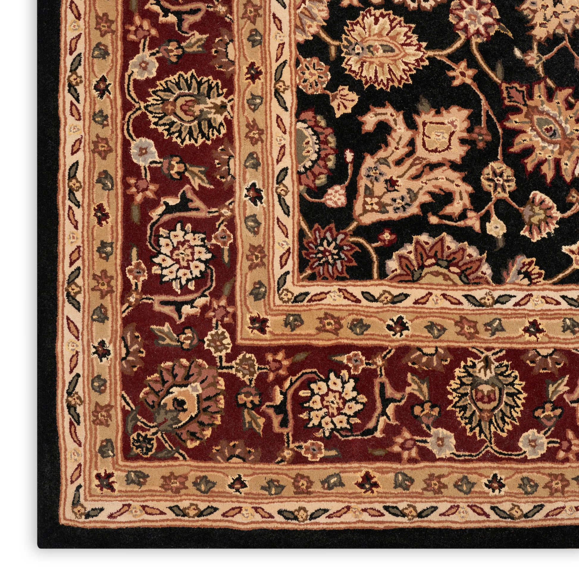 Ornate oriental rug with black field & red-beige floral borders, accented in cream, gold & olive tones.