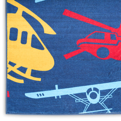 Blue kids rug featuring yellow and red helicopters and light-blue airplane silhouettes in a bold transport motif.