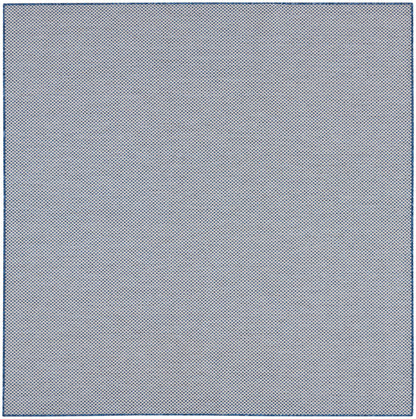Light gray fabric texture with tiny navy blue dots and a thin blue border.