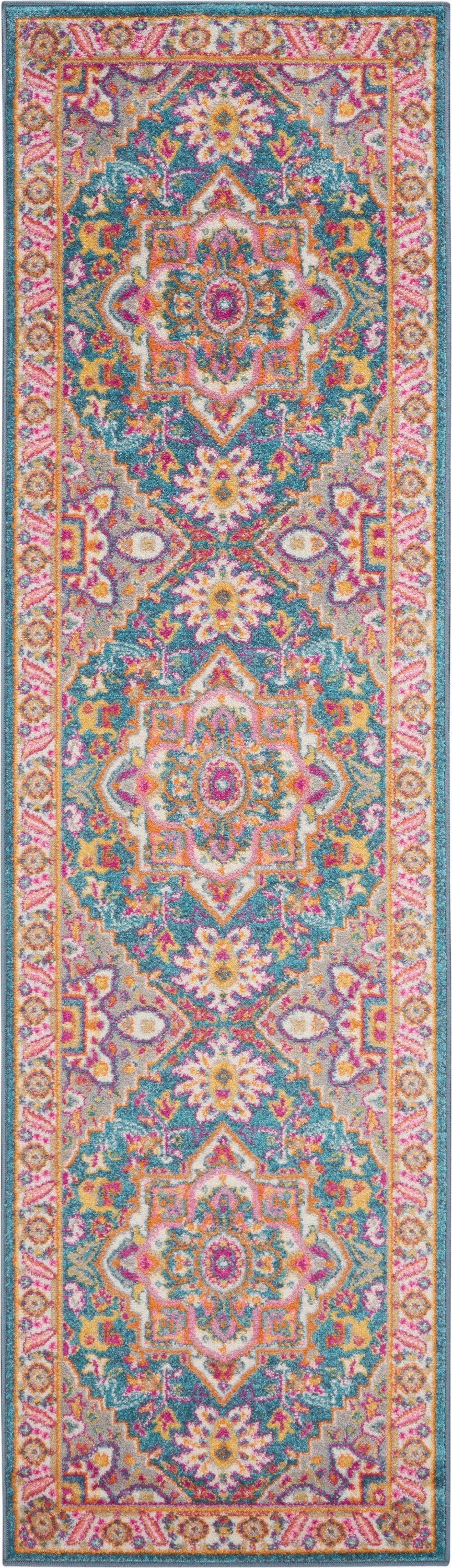 Colorful oriental runner rug with teal field, pink & orange accents, central medallions & ornate border.