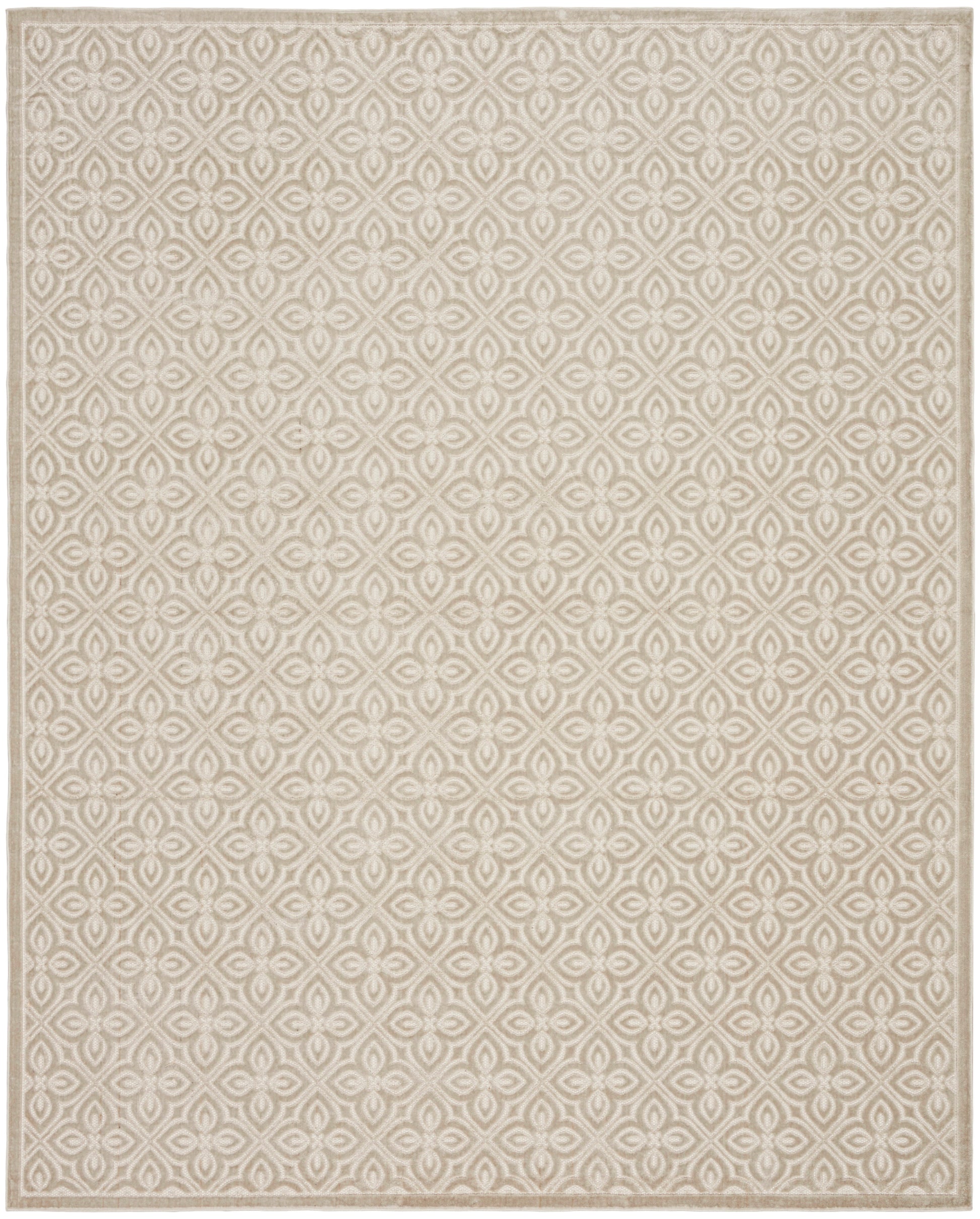 Beige area rug with an allover cream geometric quatrefoil pattern and a light border.