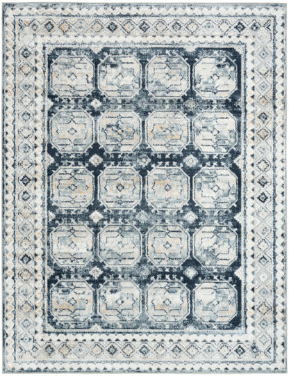 Distressed blue & ivory oriental area rug with geometric octagonal medallions and layered borders.