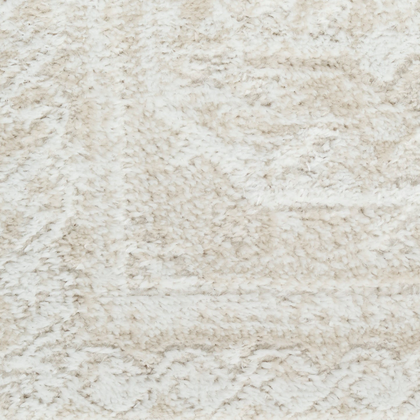 Rectangular beige shag rug with ultra-plush fluffy pile for a cozy living room floor.