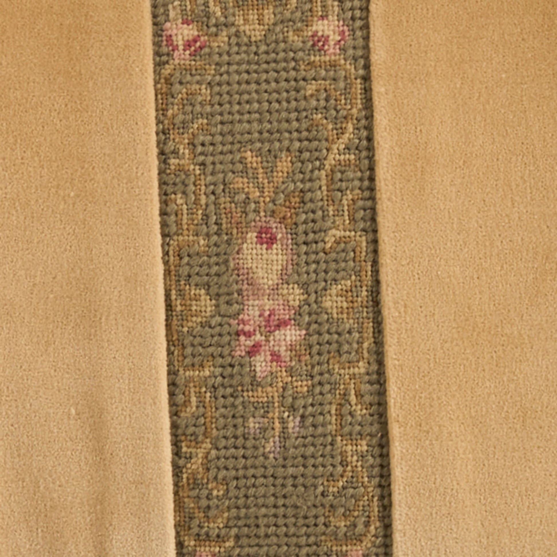 Beige rug with narrow blue-gray central panel featuring pink floral motifs and gold vines.