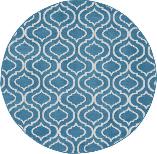 Round blue rug featuring a white trellis geometric pattern.