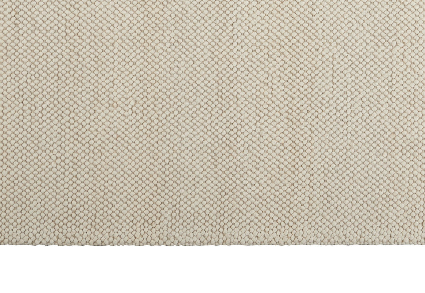 Beige woven fabric with tiny hexagonal basket-weave texture, soft upholstery textile for home decor.