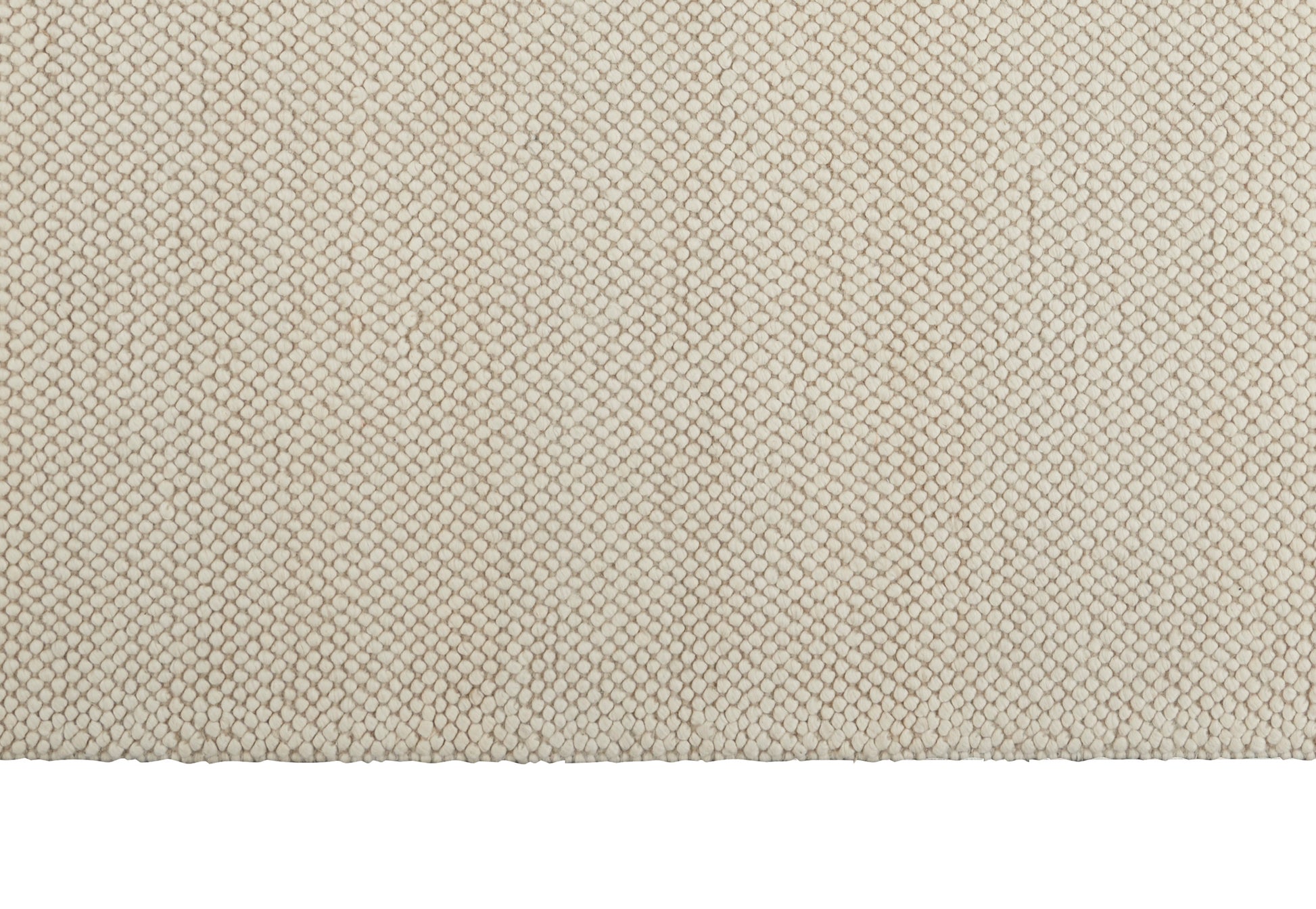 Beige woven fabric with tiny hexagonal basket-weave texture, soft upholstery textile for home decor.