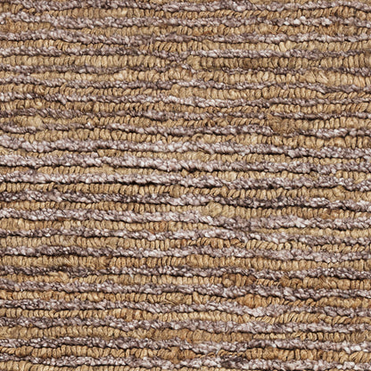 Close-up of a woven loop rug in brown, tan and beige tones; rustic textured flooring with thick yarn loops.