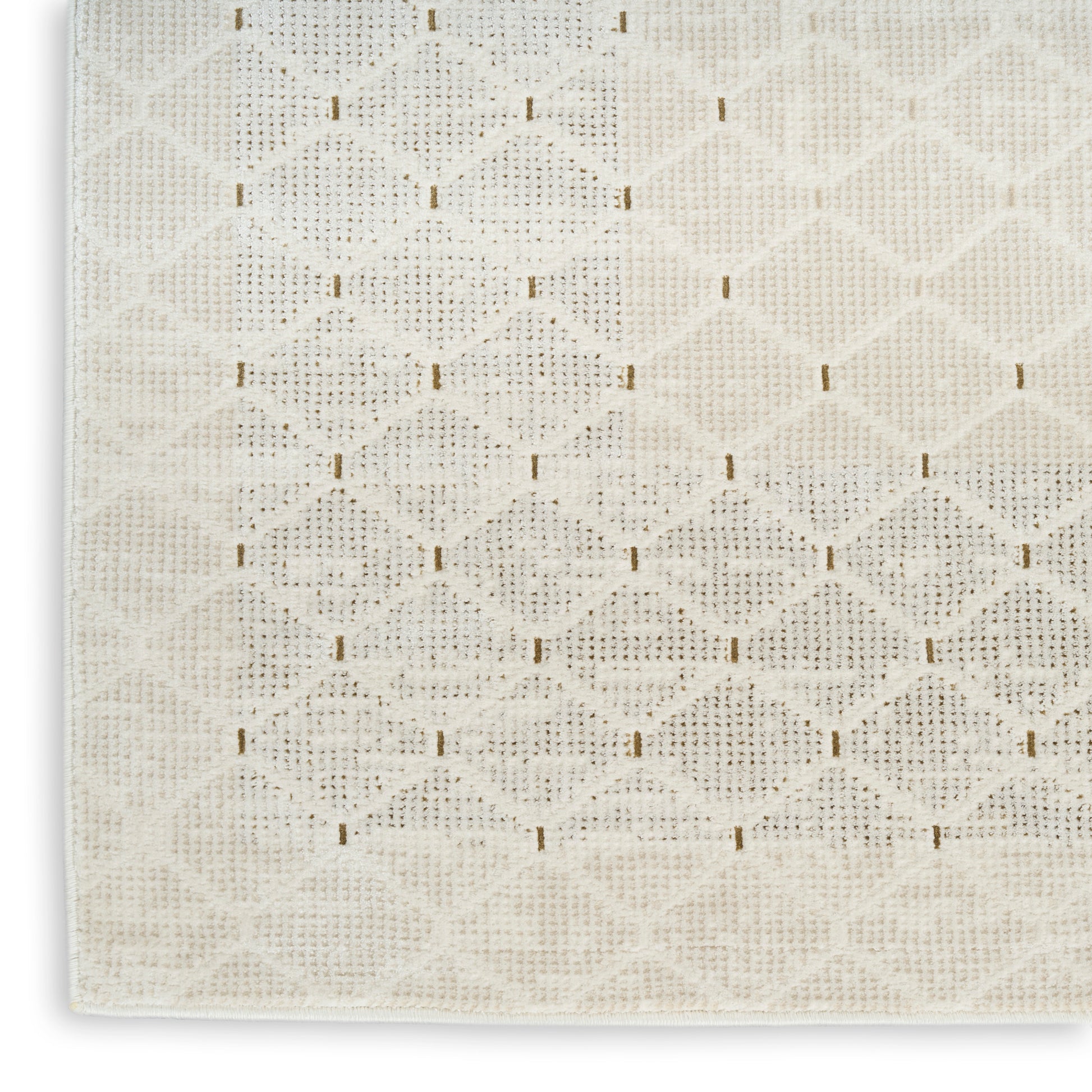 Cream rug runner with a repeating diamond scallop motif and woven texture.