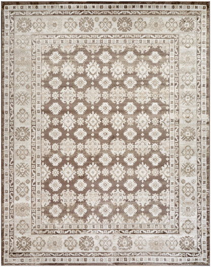 Rectangular oriental area rug in beige-brown tones with ivory floral motifs and multiple borders.