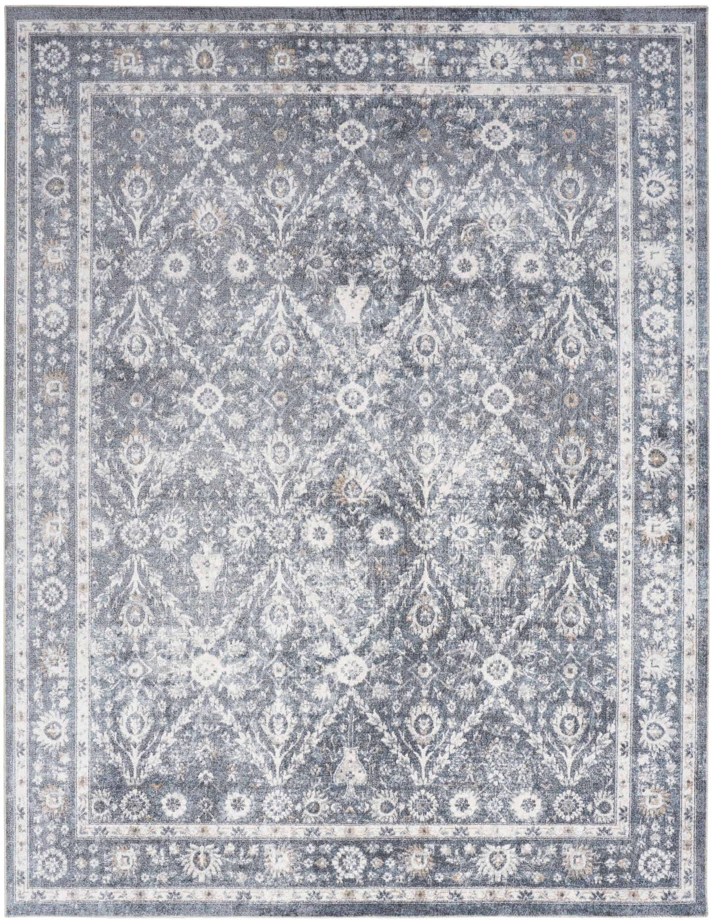 Rectangular blue-gray vintage-style oriental rug with distressed floral lattice and bordered edges; ideal living room decor.