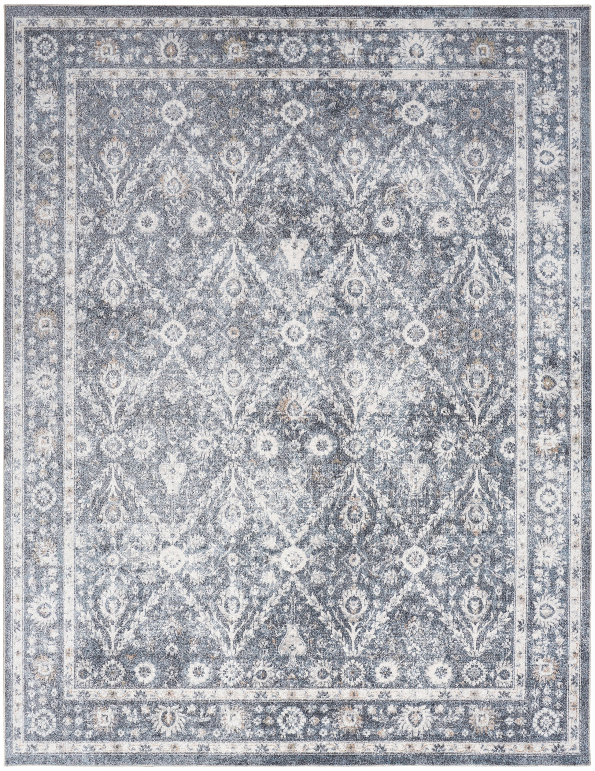 Rectangular blue-gray vintage-style oriental rug with distressed floral lattice and bordered edges; ideal living room decor.