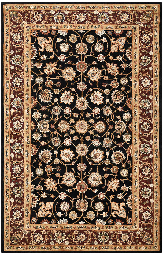 Rectangular oriental rug with black field, ivory-gold floral vines and medallions, red-brown border.