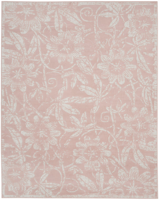 Soft blush pink rug with an all-over white floral damask pattern; rectangular, decorative area rug for living spaces.