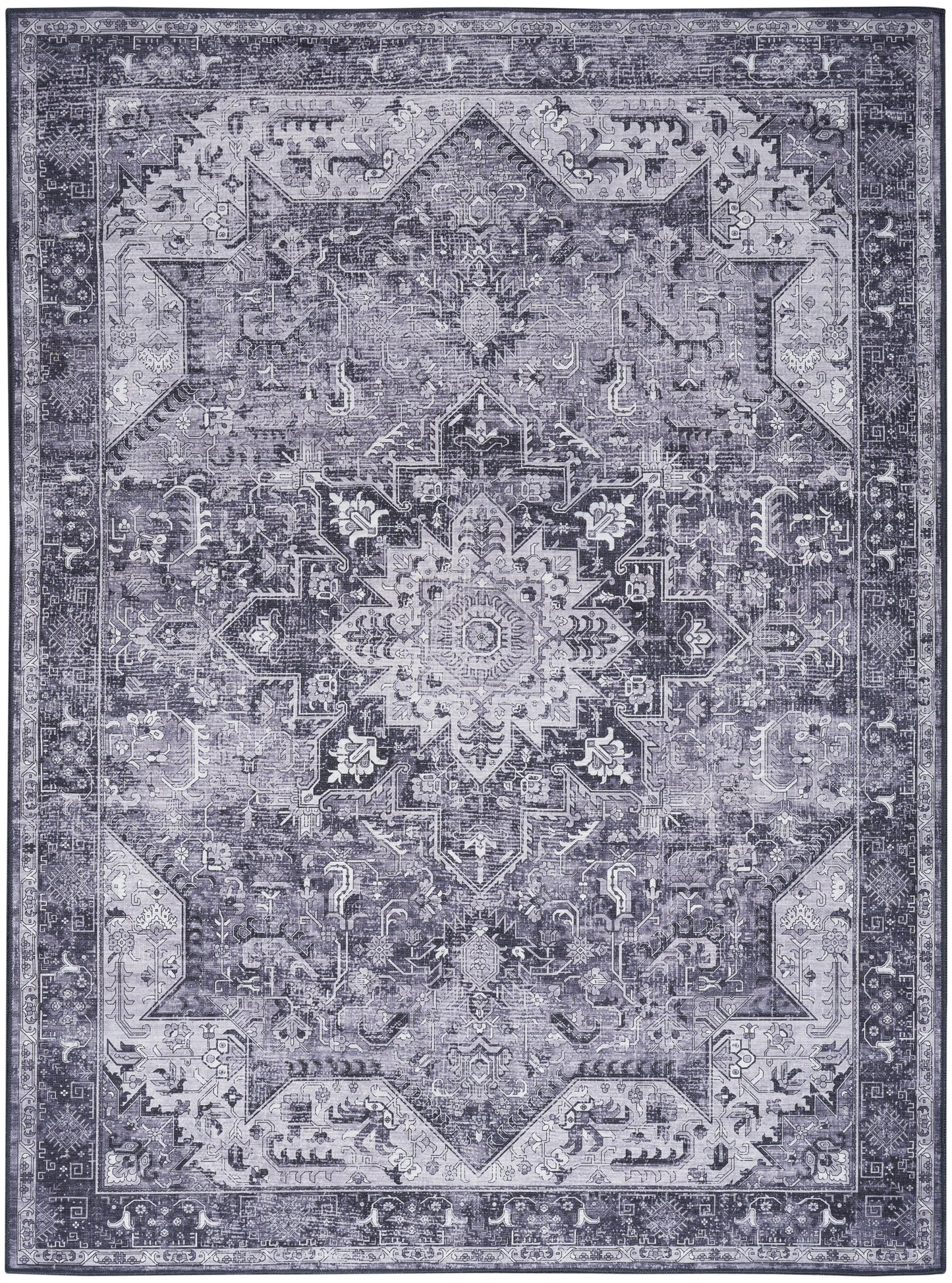 Blue-gray distressed Persian-style area rug with a central medallion and ornate geometric border.
