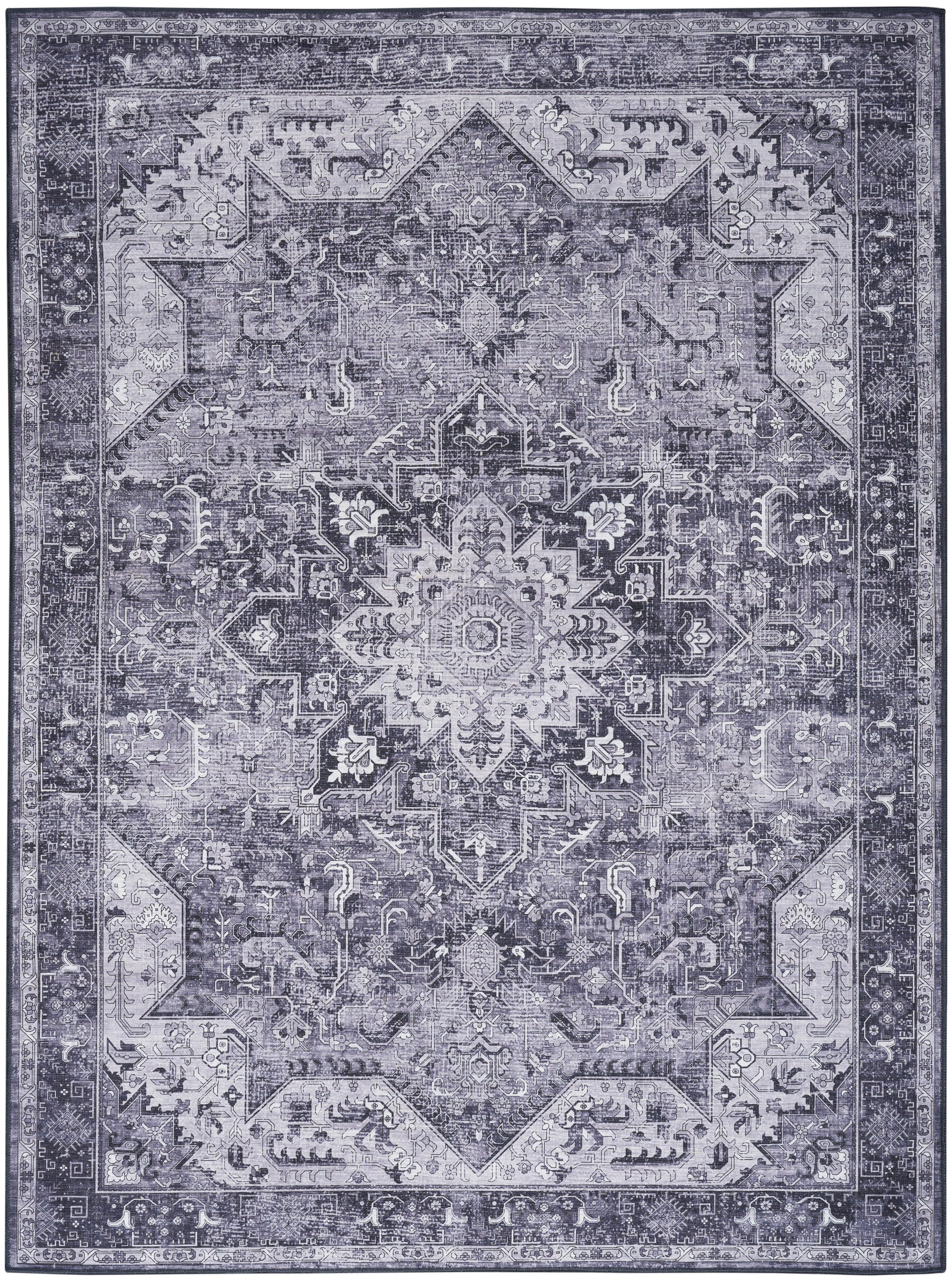 Blue-gray distressed Persian-style area rug with a central medallion and ornate geometric border.