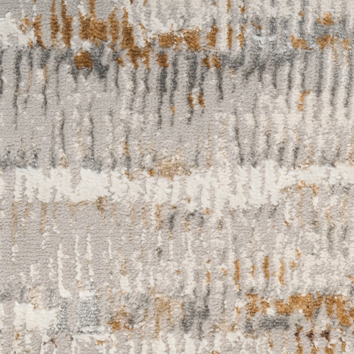 Soft textured shag rug with abstract ivory, gray and tan stripes.