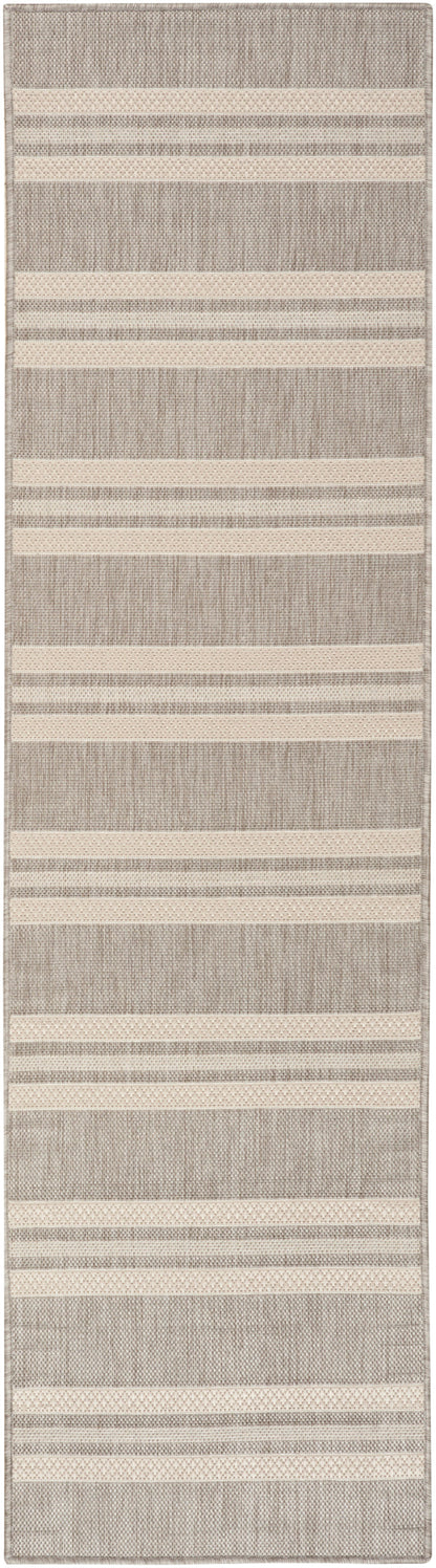 Textured taupe and cream flat-weave rug runner with pale striped bands for hallway or living area.