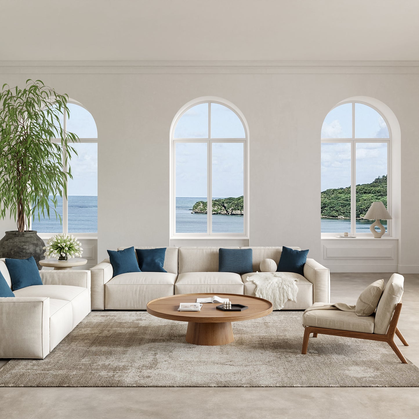 Coastal living room with arched windows, beige sectional sofa, blue cushions, round wooden coffee table, plant, and sea view.