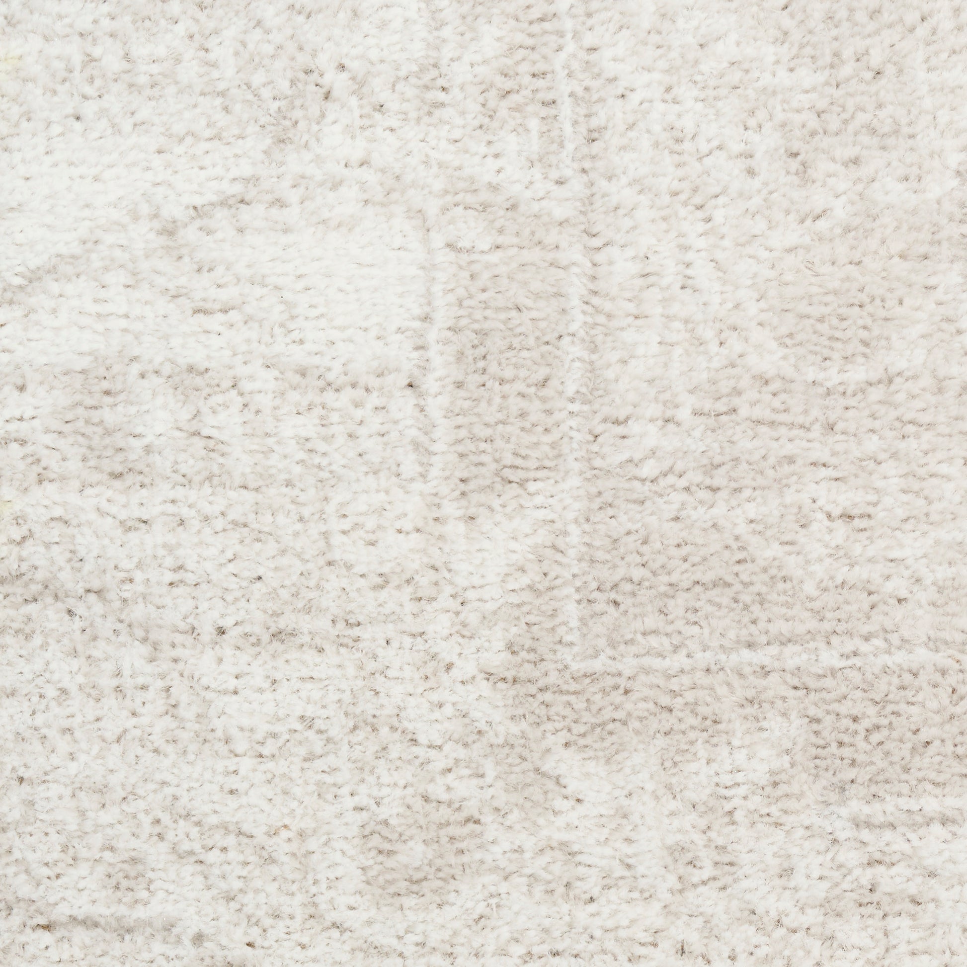 Cream beige plush shag rug texture with soft, fluffy pile for cozy living room decor.