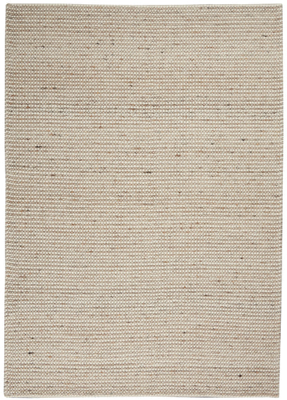 Beige flatwoven rug in natural fibers with speckled texture; rectangular, rustic minimal style.
