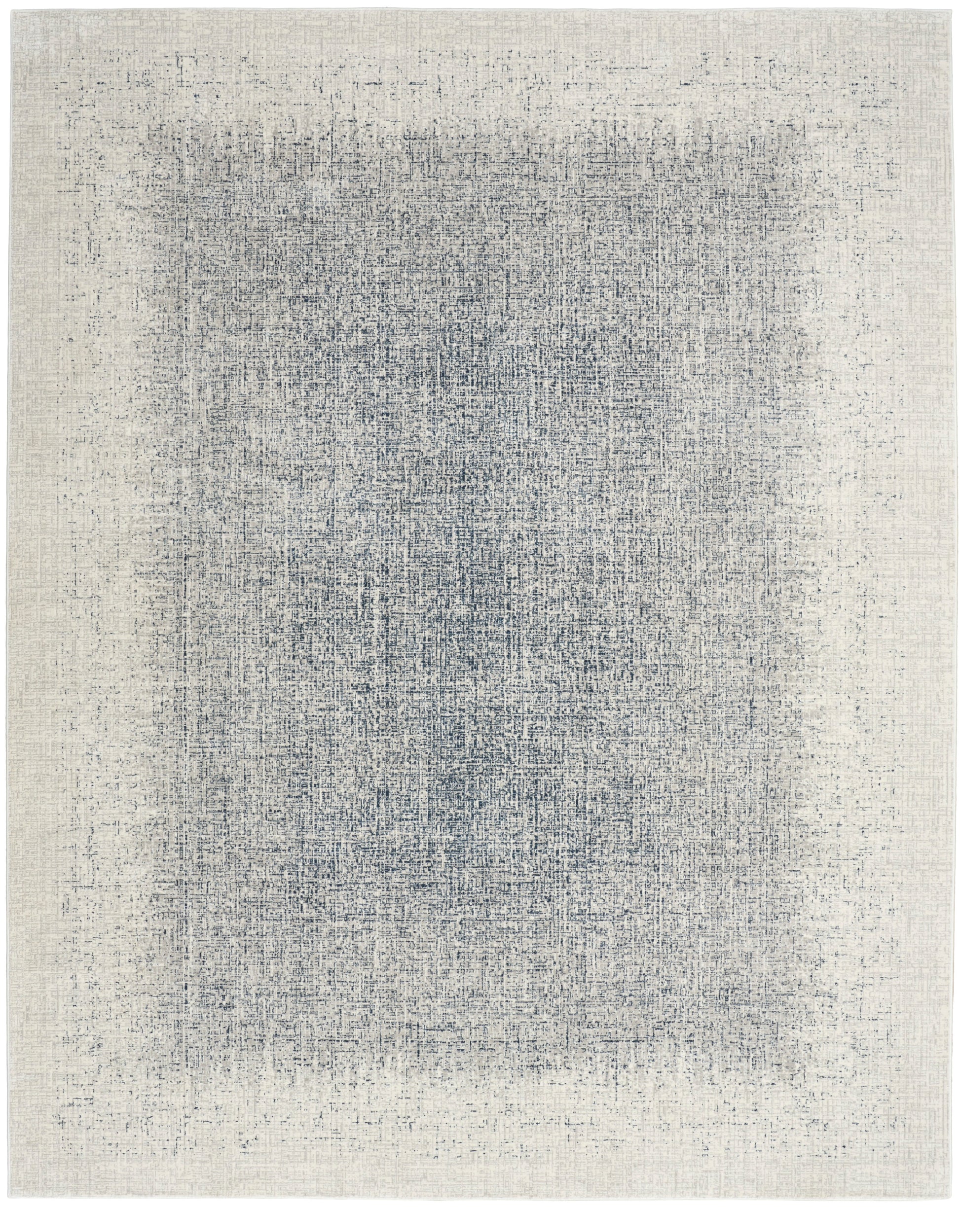 Rectangular cream rug with a distressed blue-gray center wash; woven texture, modern minimalist style for living rooms.