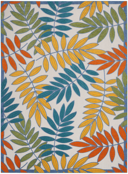 Colorful leaf-pattern rug with yellow, orange, teal and olive leaves on a light background; blue border.