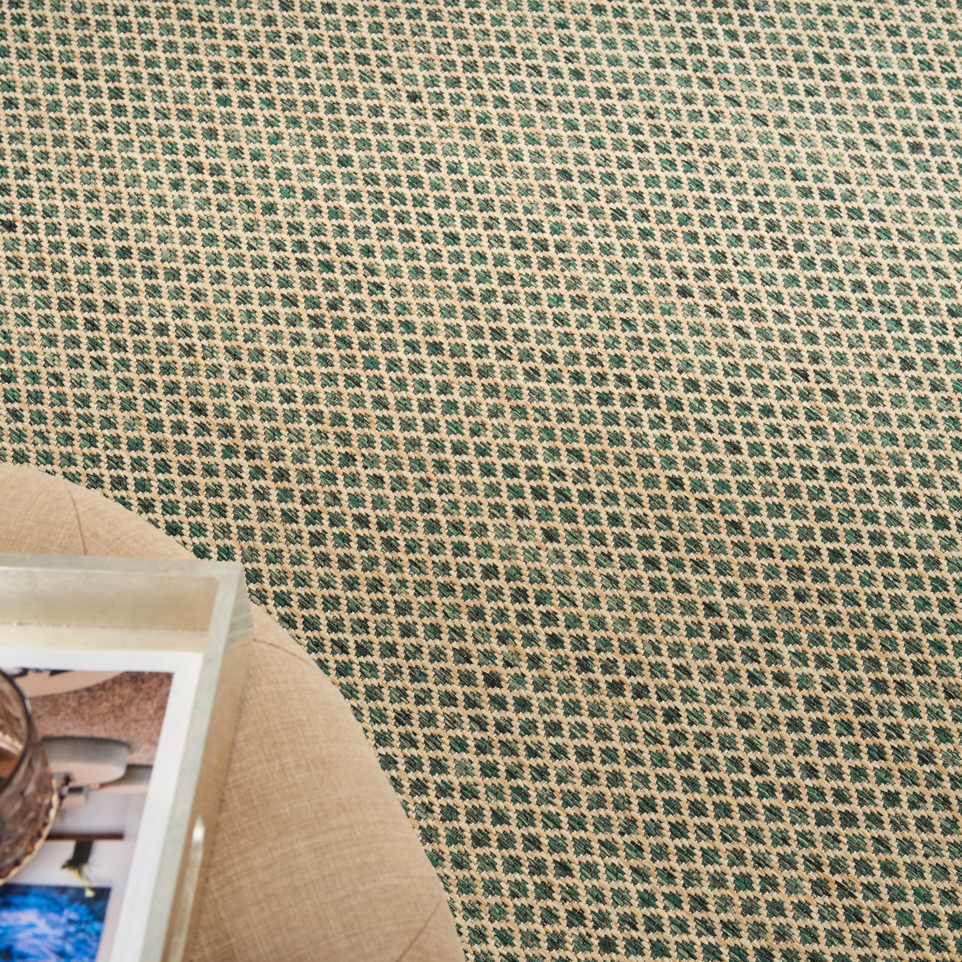 Teal & beige woven rug with a tiny square grid pattern; natural fiber look, casual living room accessory.