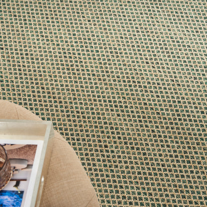 Teal & beige woven rug with a tiny square grid pattern; natural fiber look, casual living room accessory.