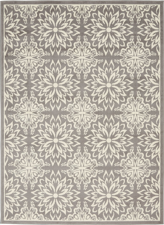 Gray rug with ivory circular floral medallions in a repeating grid and a bordered edge.