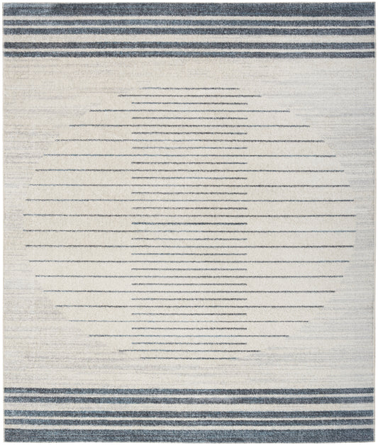 Beige flat-weave rug with a circle formed by thin navy lines and navy border stripes at top and bottom.