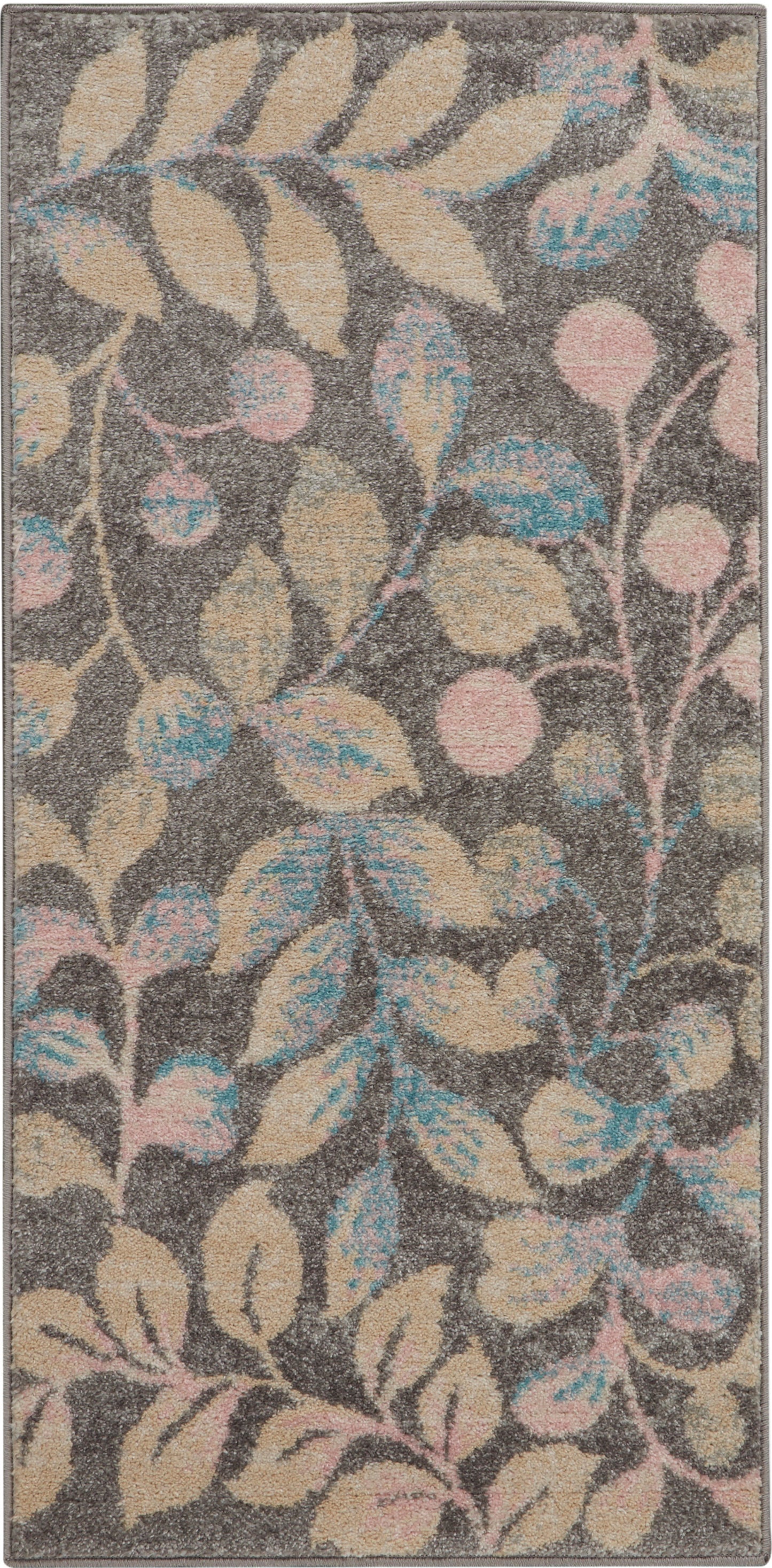 Rectangular plush gray rug with pastel beige leaves and pink and blue accents in a botanical pattern.