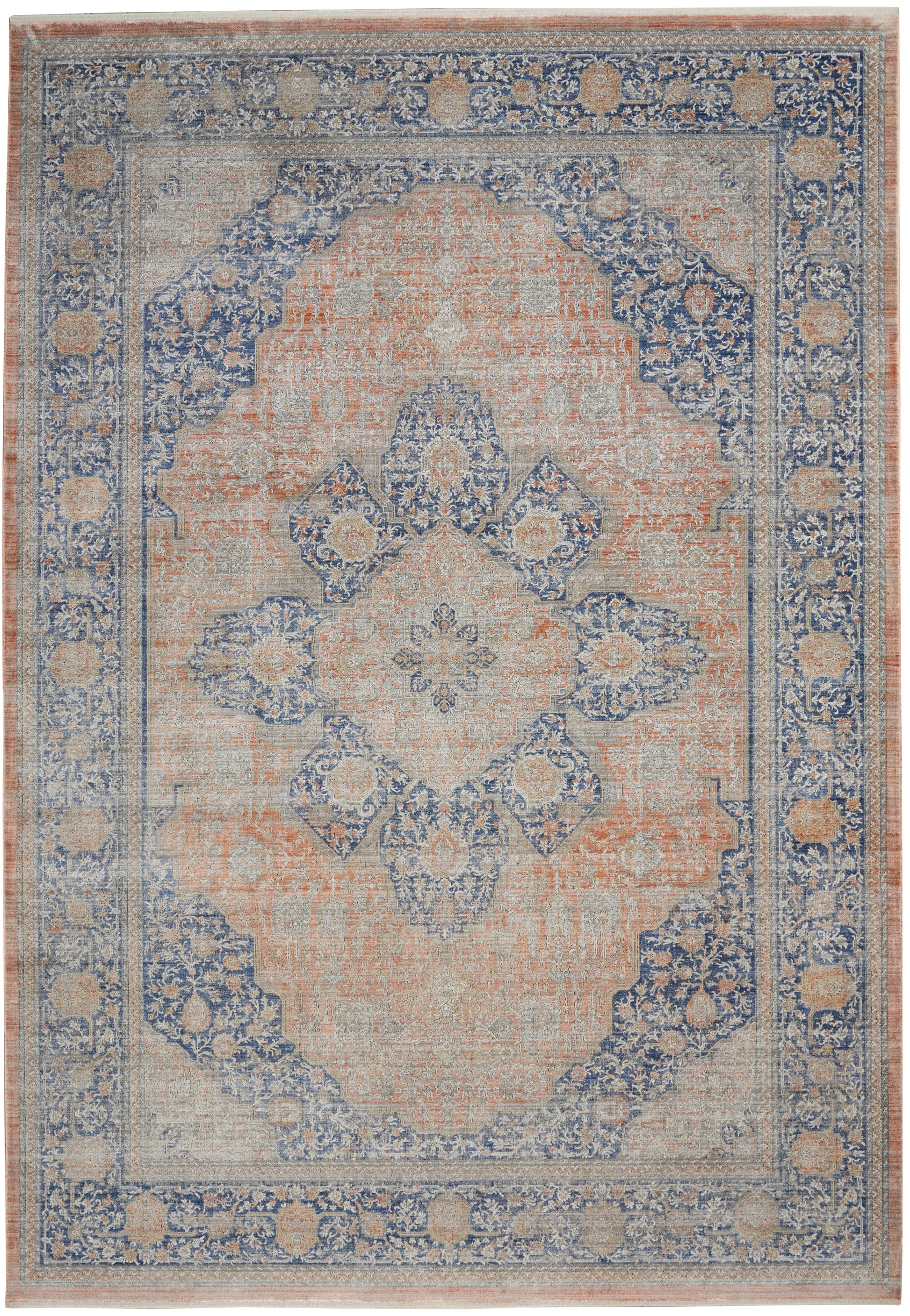 Rectangular vintage-style oriental area rug in peach and blue with a distressed central medallion and floral borders.