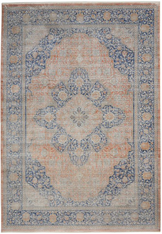 Rectangular vintage-style oriental area rug in peach and blue with a distressed central medallion and floral borders.