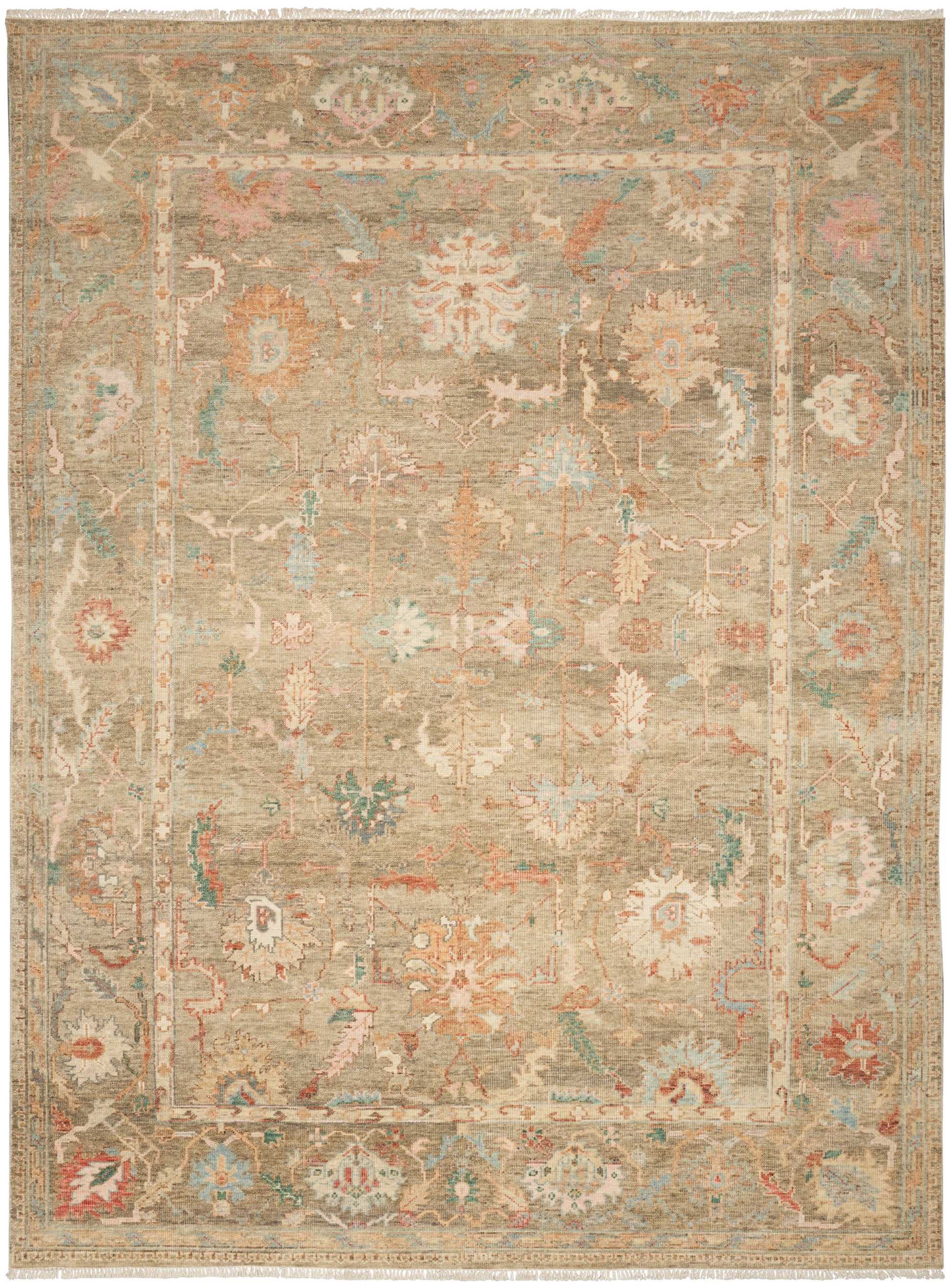 Beige distressed oriental rug with muted floral medallions; ivory, sage and peach with blue, fringed edges.