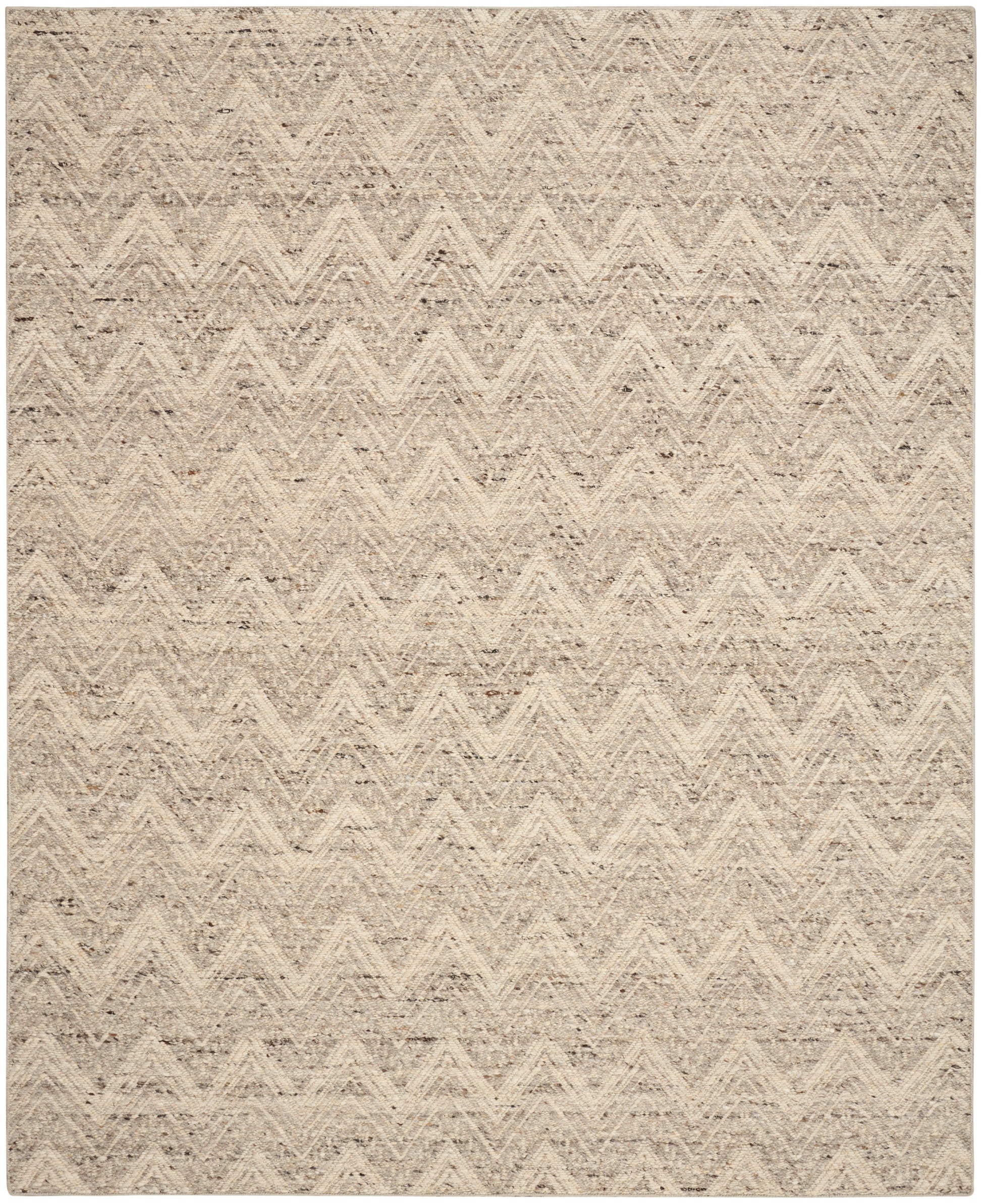 Beige textured rug with a soft chevron zigzag pattern in neutral tones.