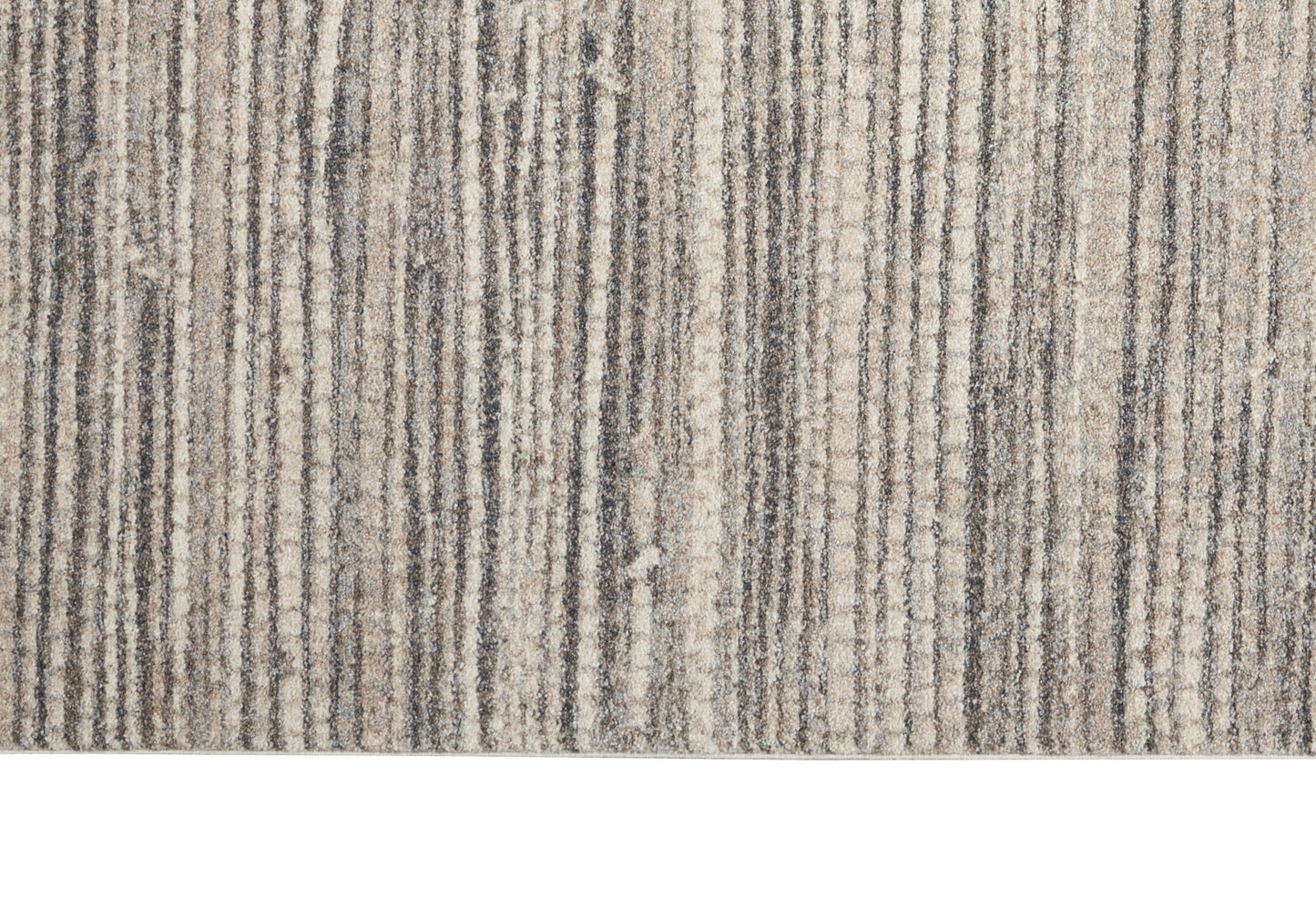 Beige, taupe and gray striped textured area rug close-up with a soft pile.