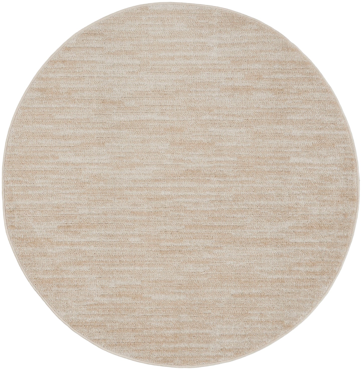 Beige round rug with soft marled texture and neutral cream tones; versatile modern decor accessory.