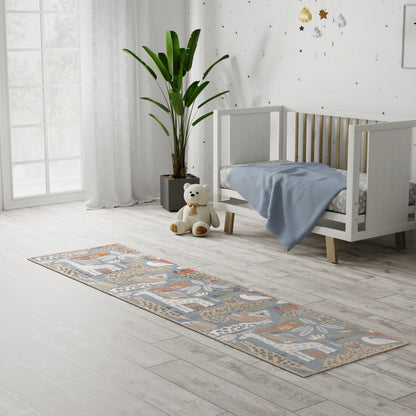 Boho blue-beige runner rug in a bright nursery with a white crib, plush teddy, potted plant, & light wood floor.