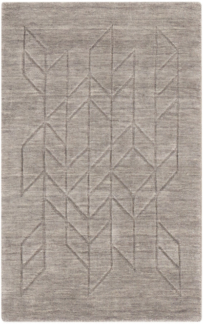 Gray rug with subtle geometric chevron and diamond pattern, soft woven texture, modern decor.