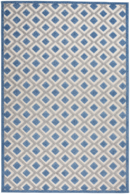 Rectangular woven rug with blue border and a cream background featuring a blue diamond lattice pattern.