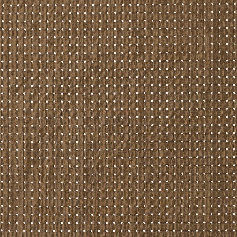 Brown textured fabric with a white dot-grid pattern, close-up upholstery or craft material.