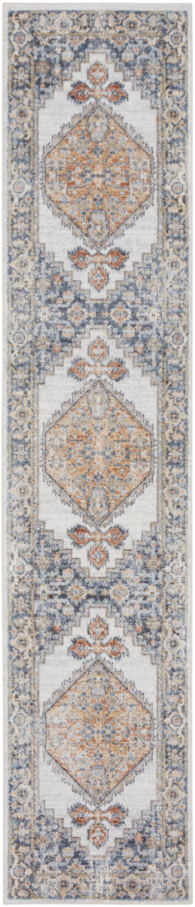 Persian-style runner rug with repeating peach diamond medallions, blue and cream floral border; decorative hallway accent.