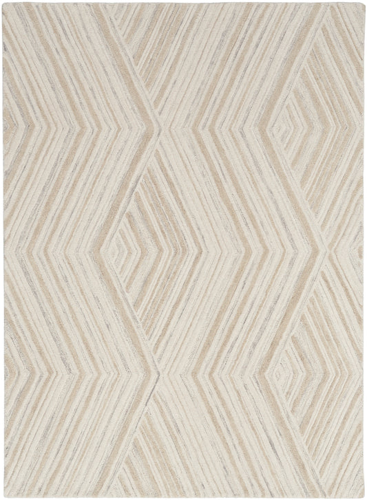 Beige cream geometric area rug with concentric diamond and chevron pattern; soft textured pile.