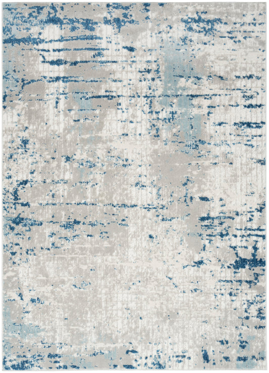 Abstract distressed blue pattern on cream rectangular area rug; modern contemporary design.