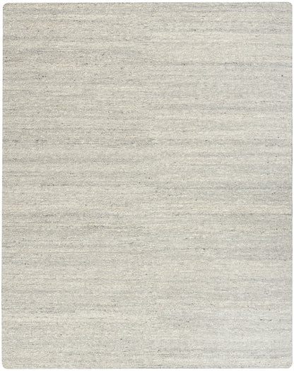 Light beige woven area rug with subtle gray specks, neutral textured floor covering for living spaces.
