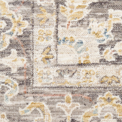 Gray and beige patterned rug with gold and light blue floral motifs and ornate border; traditional vintage style.